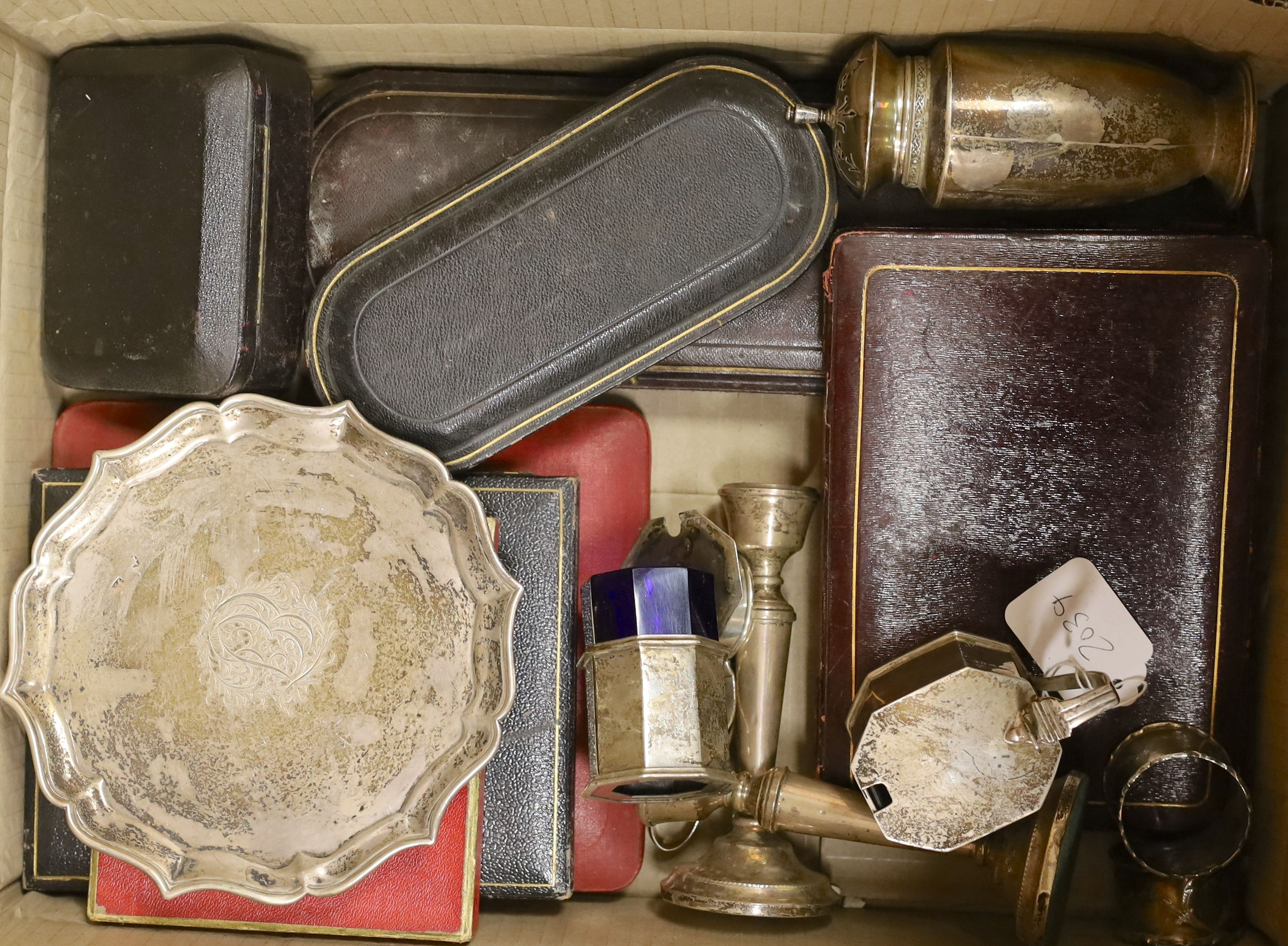 A mixed quantity of assorted small silver, including cased sets of teaspoons and tea knives, a cased pair of Victorian silver fish servers by George Adams, small waiter, condiments, napkin rings, pair of silver candlesti